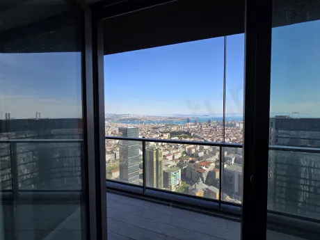 Boğaz Manzaralı, Kapalı Mutfaklı ve Odaları Birleştiren Dev Balkonlu 1+1