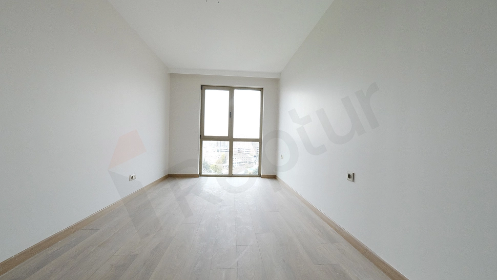 Aydınlık ve modern yatak odası iç mekan görseli.