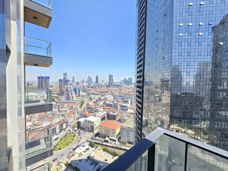 İstanbul Şişli'de yüksek bir binadan görünen panoramik şehir manzarası.
