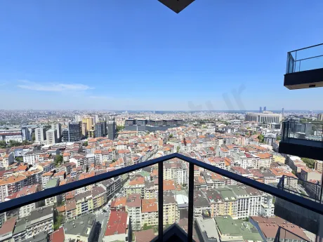 İstanbul Şişli'de yüksek bir kattan çekilmiş geniş panoramik şehir manzarası.