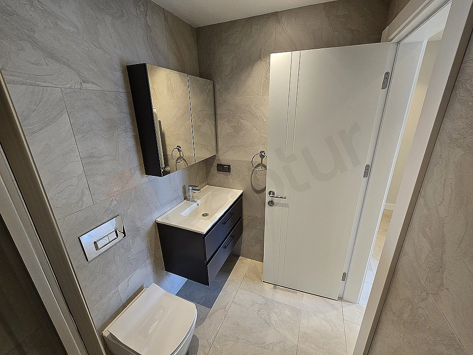 Eşyalı daire banyo görseli.