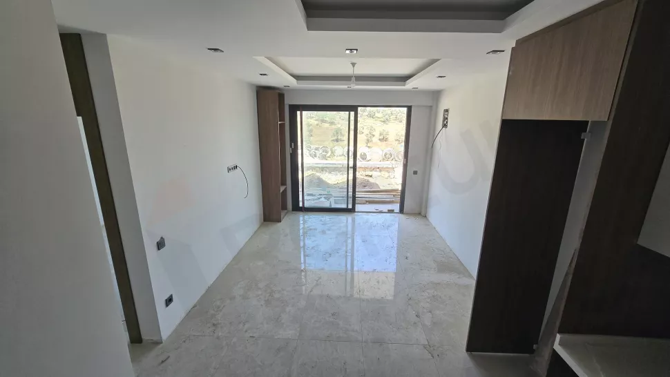 Bodrum'da Satılık 1+1 Daire - Vatandaşlığa Uygun Havuzlu Yeni Proje