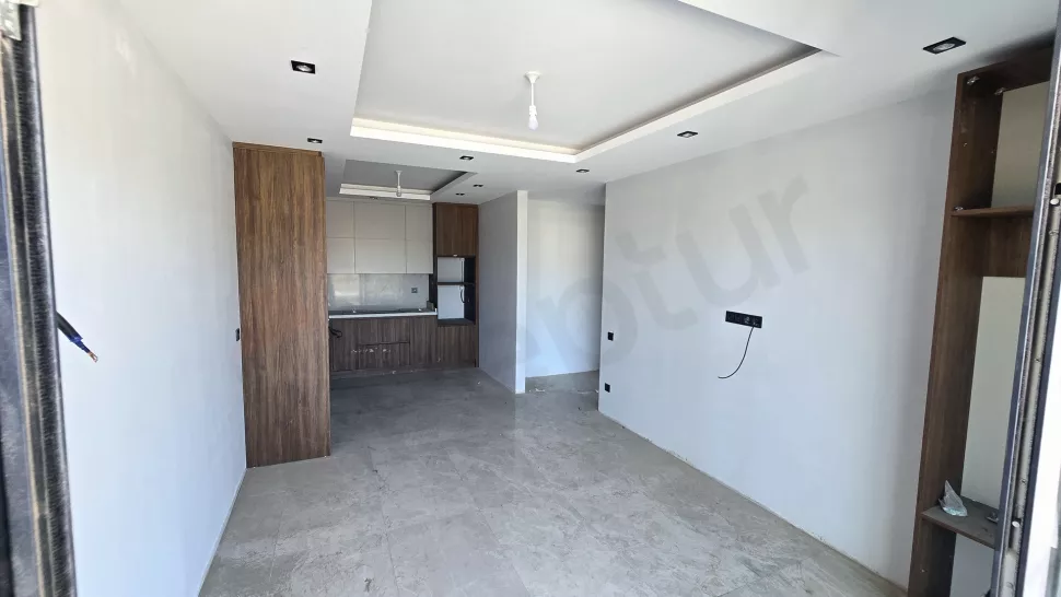 Bodrum'da Satılık 1+1 Daire - Vatandaşlığa Uygun Havuzlu Yeni Proje