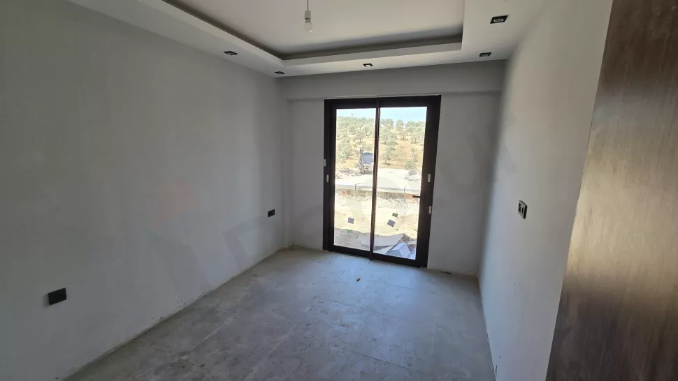 Bodrum'da Satılık 1+1 Daire - Vatandaşlığa Uygun Havuzlu Yeni Proje