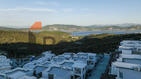 Bodrum'da Özel Plajlı ve Havuzlu Sitede Satılık Konforlu Daire